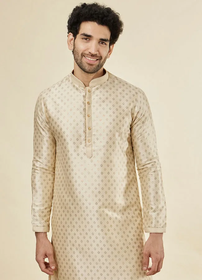 Manyawar Biscuit Cream Shankh Patterned Kurta Set